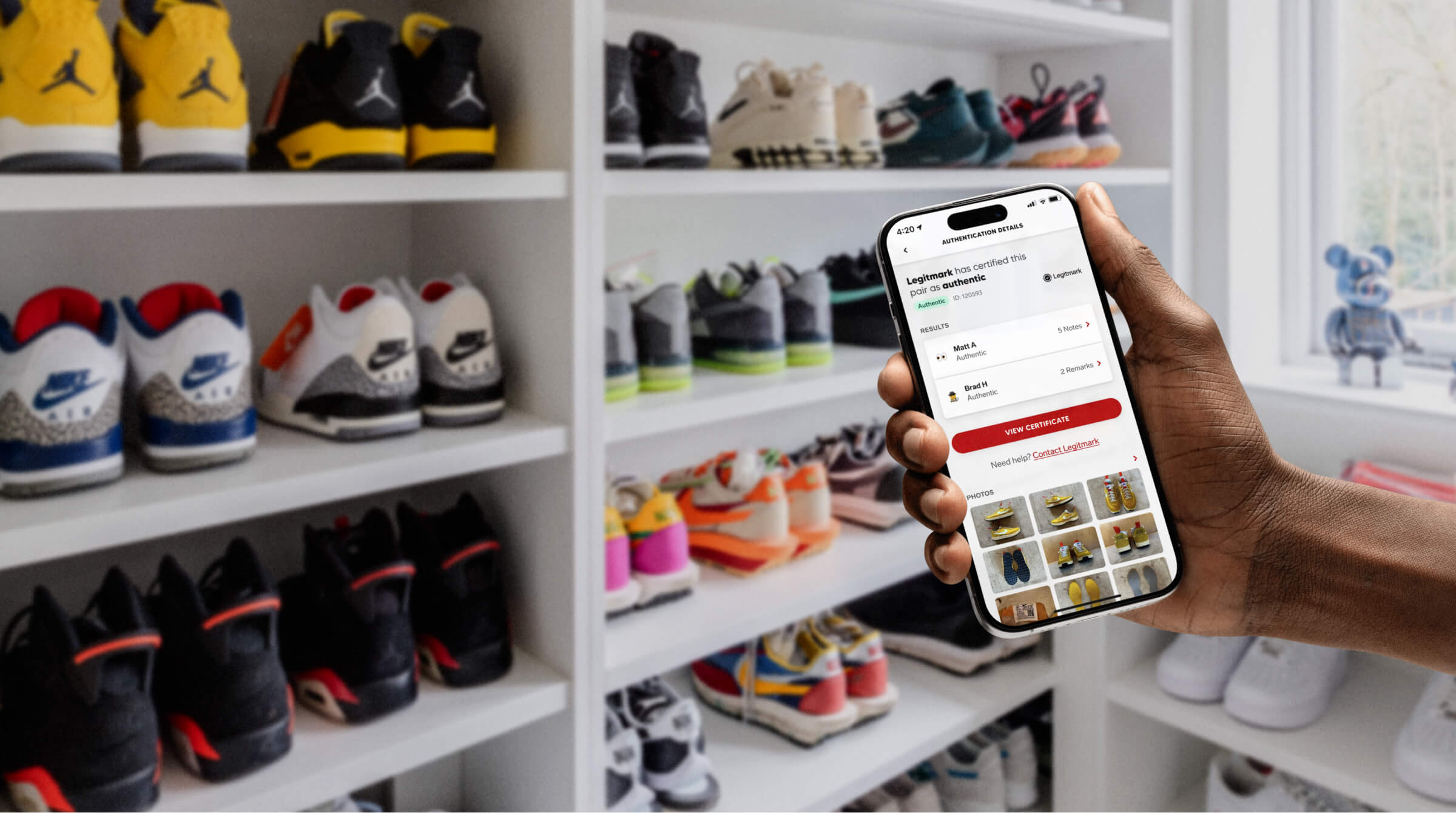 Image of a sneakerhead using the Collect authentication feature infront of their sneaker collection